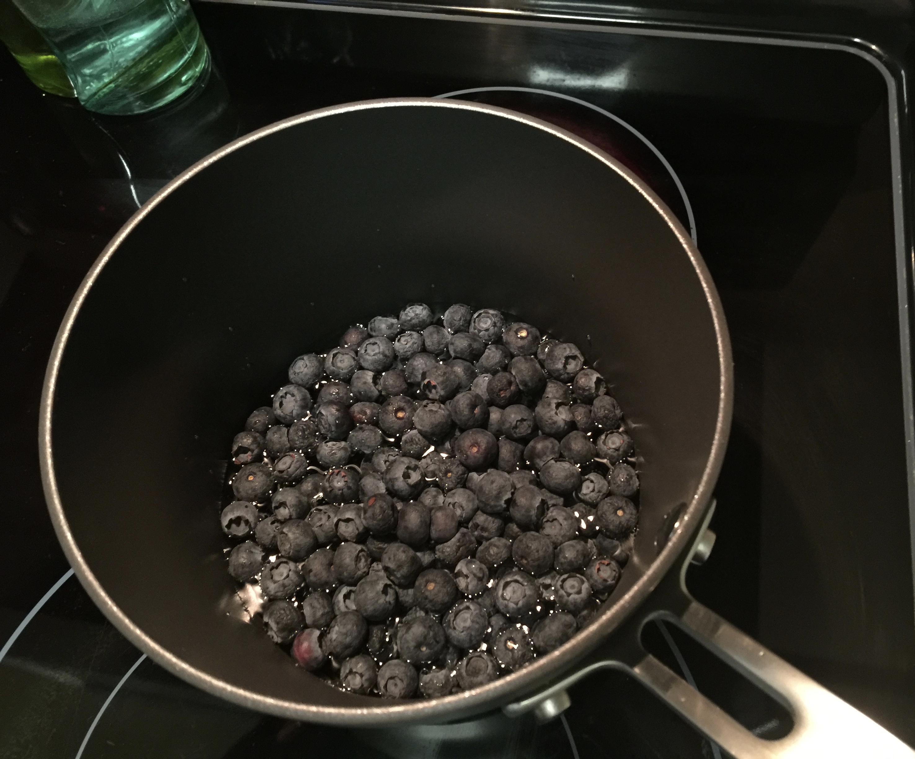 Simmer the blueberries with a little water