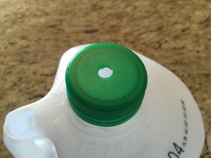 Milk jug ventilation hole